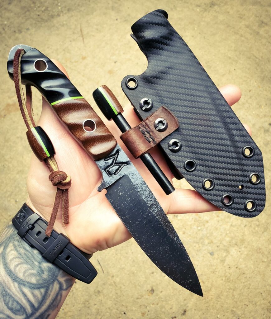 This little blades headed out 80crv2 with G10 split and dark Micarta and some Titanium pins.