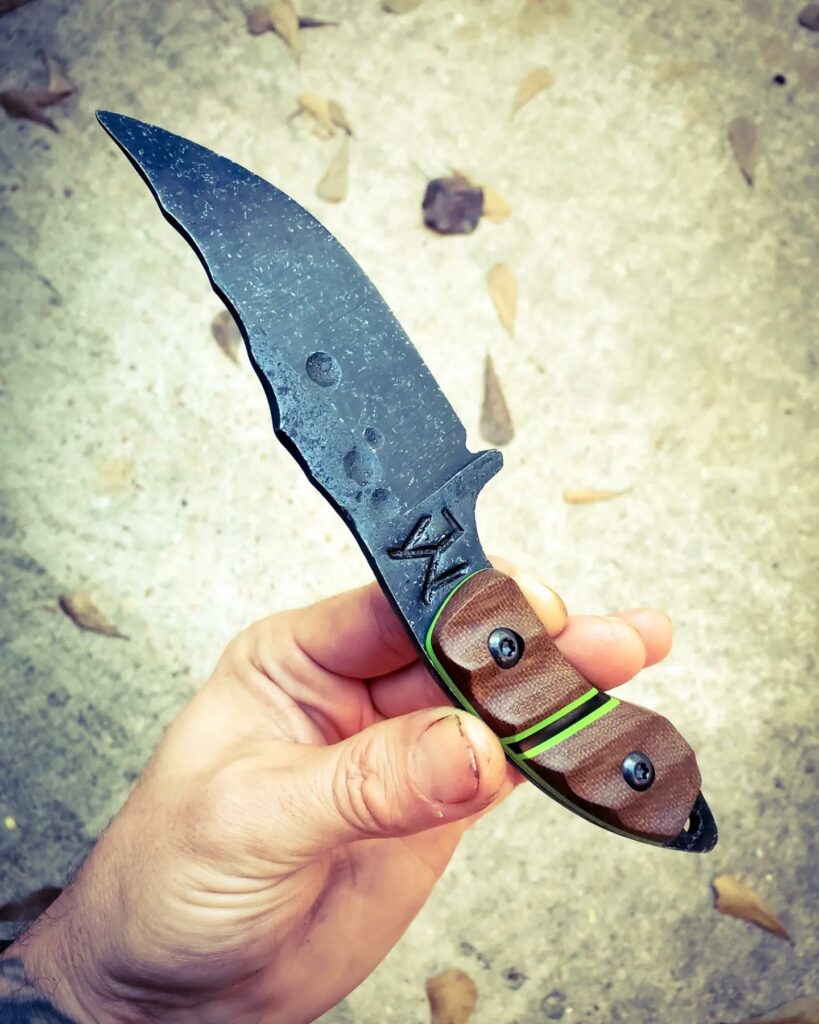 80crv2 skinner with Dark brown Micarta and toxic green G10 liners with a little black in split.