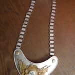 3 of 3- Not a knife, but goes with the 2 previous WW2 German artifacts. German WW2 Gorget, aluminum plate with 2 piece insignia of aluminum "Der Stahlhelm" (Steel Helmets) on a gilt aluminum insignia, steel chain, marked RZM and maker marked M34/2 on back on clip, felt back [4608x3456][OS][OC]