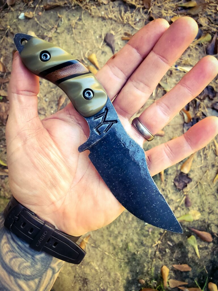 80crv2 with OD green G10 and black G10 liners with a Dark brown Micarta split 🤙