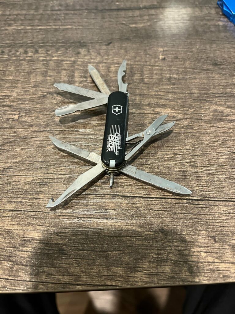 I found this old Victorinox mini champ and it’s a bit corroded. How do I clean this thing?