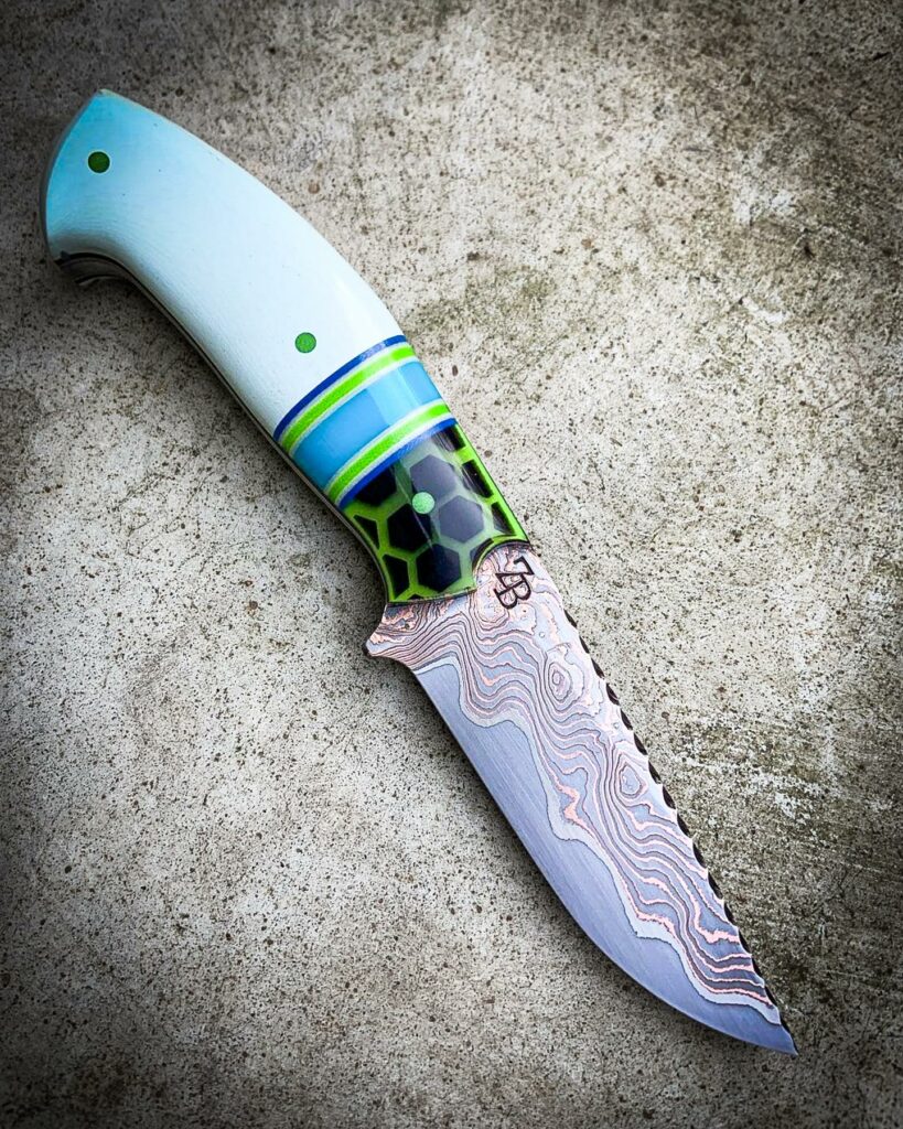 I went for an 80's surf theme on this handle. What do you think? Blade by Zane Burch