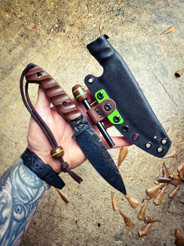 80crv2 with some G10 and Dark Micarta, Titanium pins.