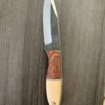 My wife got me this knife for my birthday from a friend of ours who is a custom knife maker.