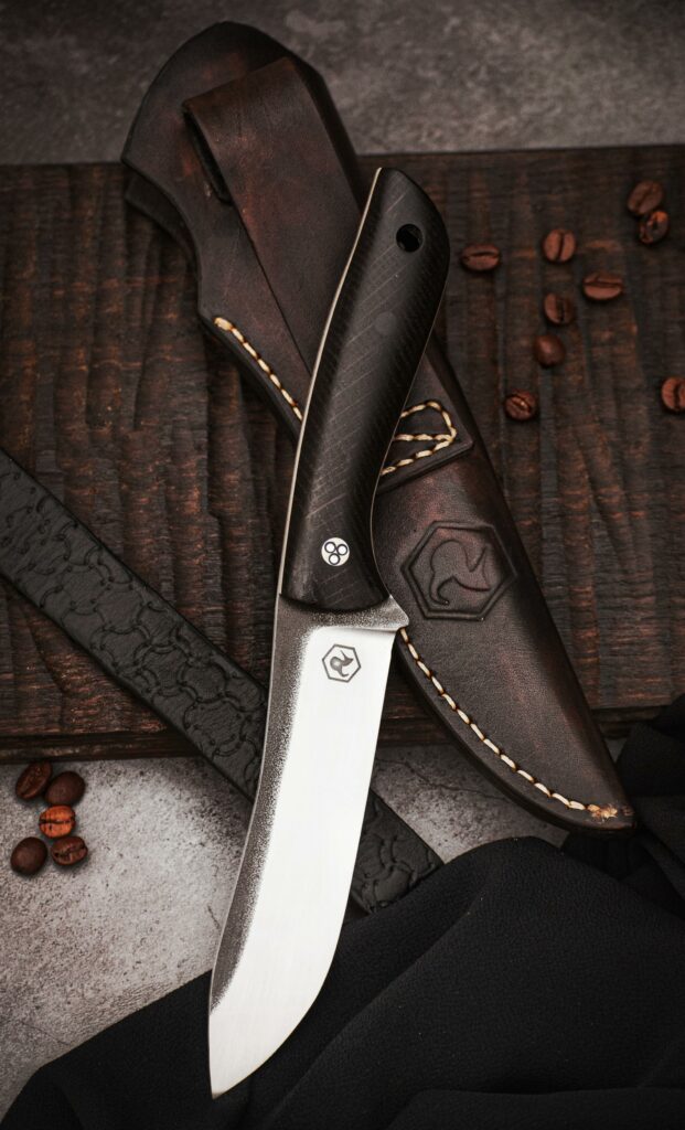 Handcrafted by me knife made of N690 steel with stabilized black bog oak (7420 years old - radiocarbon dating)
