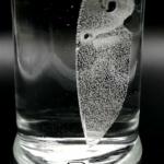 Sebenza custom blade etching for Damascus manifestation