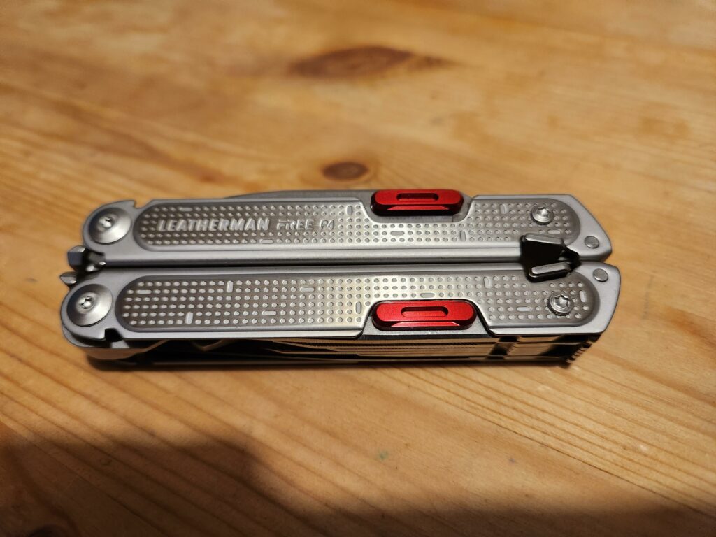 Added aluminum thumb tabs to my Leatherman P4.