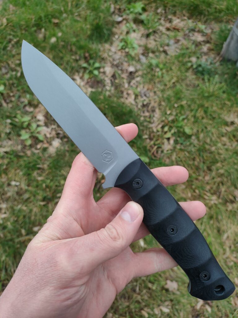 Made by me droppoint. 80CrV2 with cerakote coating and black G10 handle