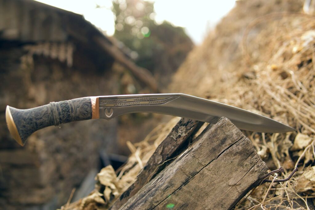 A forest camo micarta 16" chitlange captured during golden hour