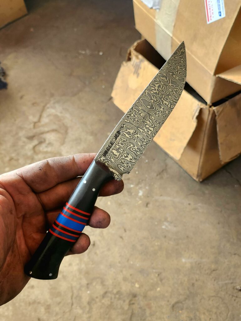 Newest from Uncle Jed. 68 layer Damascus. G10 handle.