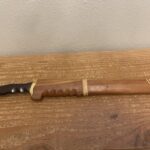 Can someone help me out with this? I found it in a pawnshop for a ridiculously low price, from the feel of the knife anyway, but I don’t have any idea what it is. 20″ Overall, Blade 13″