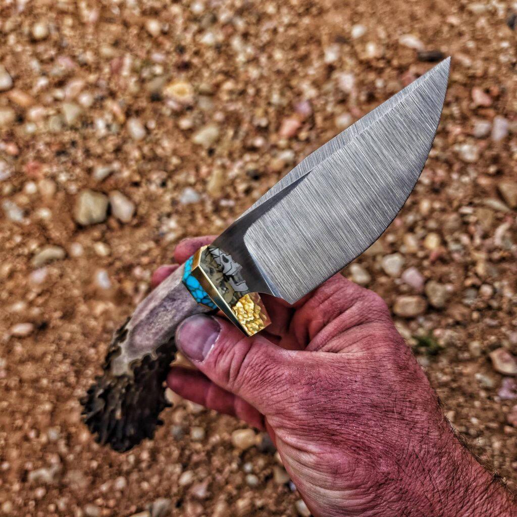 brass trustone and deer antler