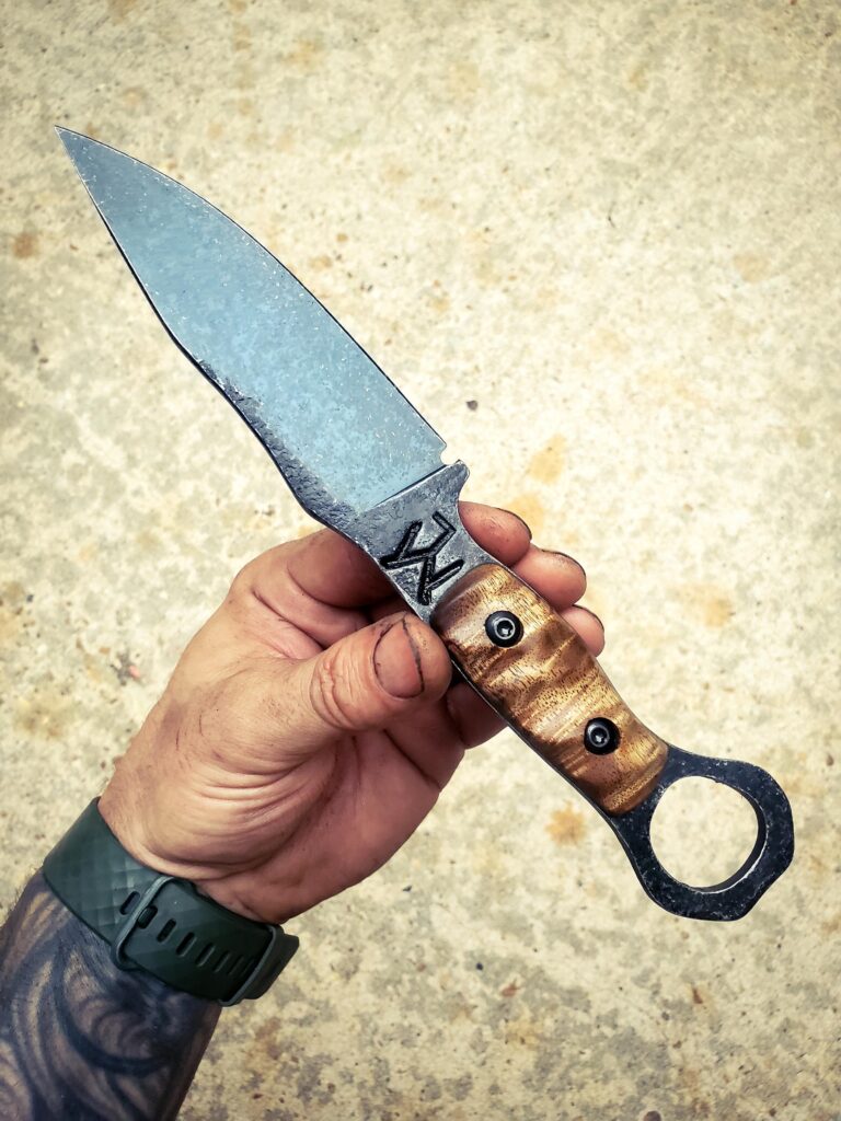 80crv2 , Acacia wood handle with Forest green G10 liners.