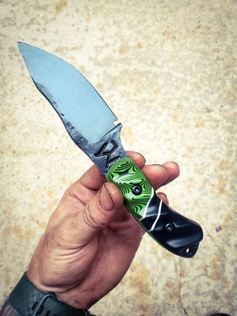 80crv2 with some toxic green and black G10 with white G10 and carbon fiber split.
