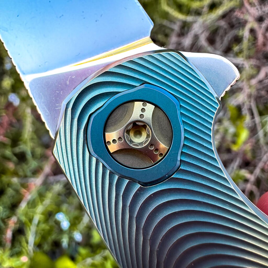 It looks like a sunrise in my hand. Holt Morpheus #1121 Refined, with Ridgeback milling 87V ti, 55V pivot and clip.