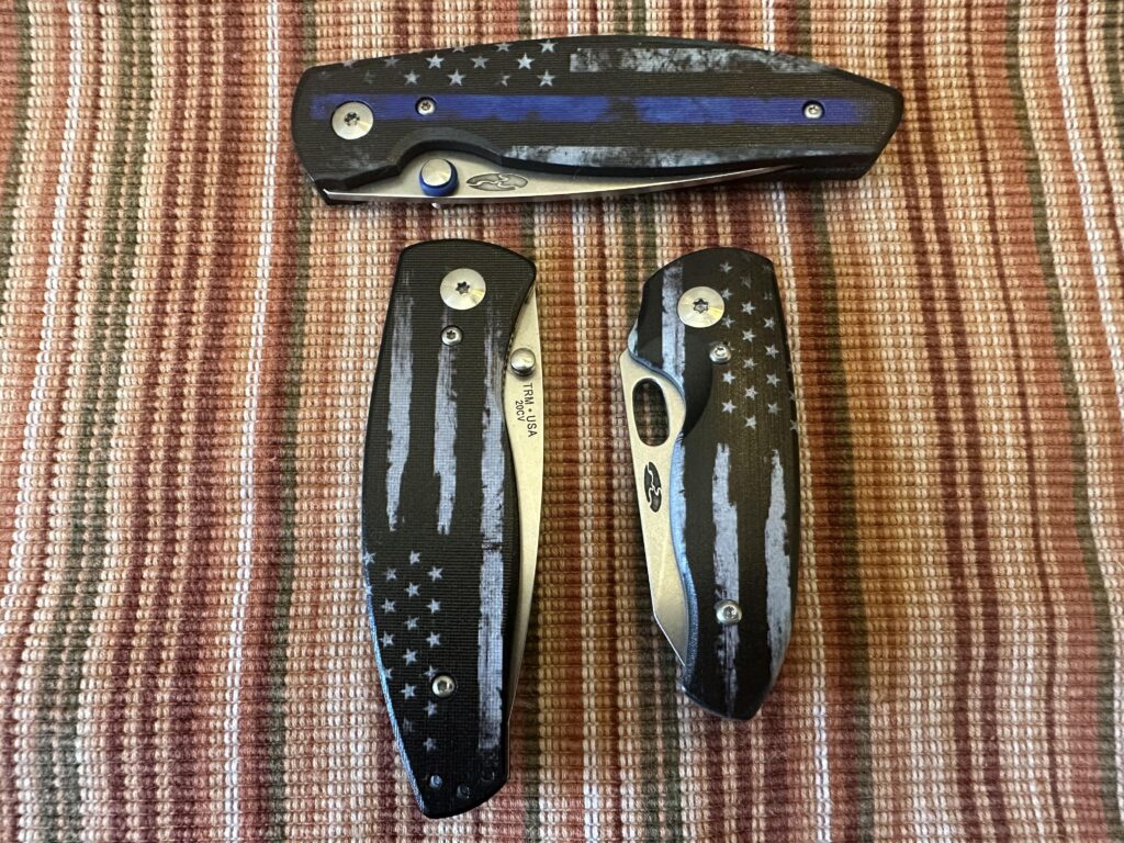 Dressed up my TRM knives for the 4th! TRM Atom, Nerd and OG Neutron.
