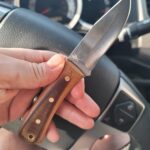 Finished this beauty up last week. Fixed blade Buck 112 clone blank from Plainsmen Knives dressed in some gorgeous vintage linen micarta with phenomenal patina, brass pins and tube.