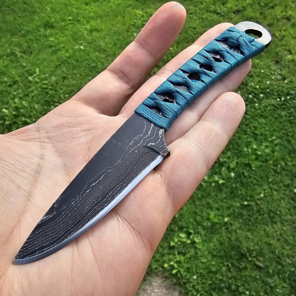[OC] Turquoise wrapped Alabama Damascus drop-point Hunter