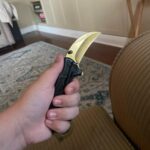 I know it’s a little tacky, but it was my first Karambit. Thoughts?