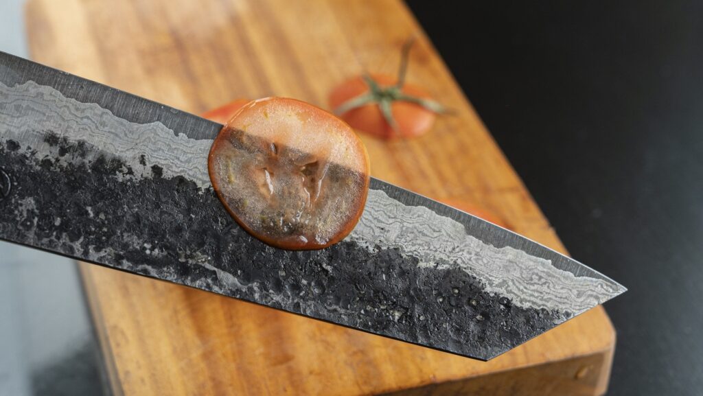 [2520x1419] Dao bunka damascus from viet-kife.com slicing tomato