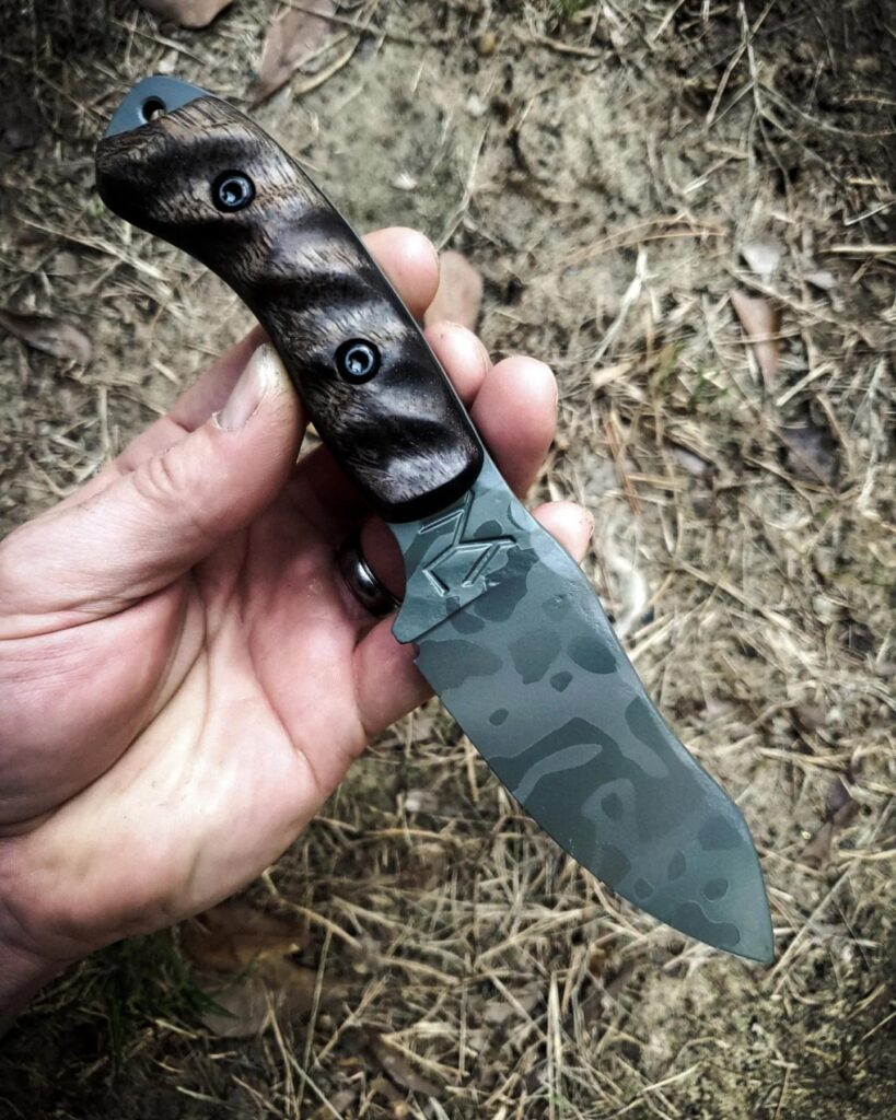 This EDC is cerakoted in three tone custom camo job. Handles apocalyptic mango.