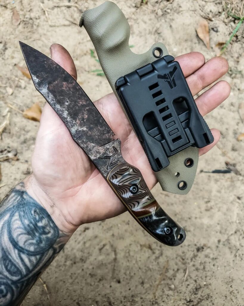 1095, Apocalyptic finish, handles Carbon fiber and G10 with Micarta split👍