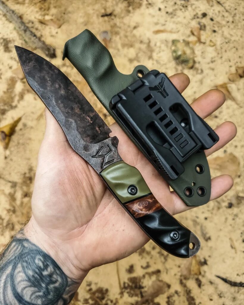 80crv2 with Apocalyptic finish OD green and black G10 with a Redwood lace burl split.🤙