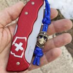 Bronze paracord bead.