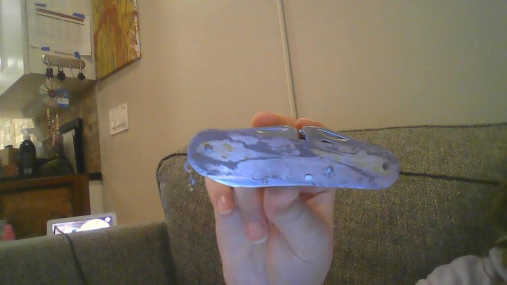 can anyone help me identify what kind of multi too this is please? it contains two knives, a saw, a nail file, a ruler, a pair of scissors and plyers, a few bottle openers, a corkscrew, a leather sewing needle, and a loop bit for a keychain, sorry it didnt have a cover when i found it