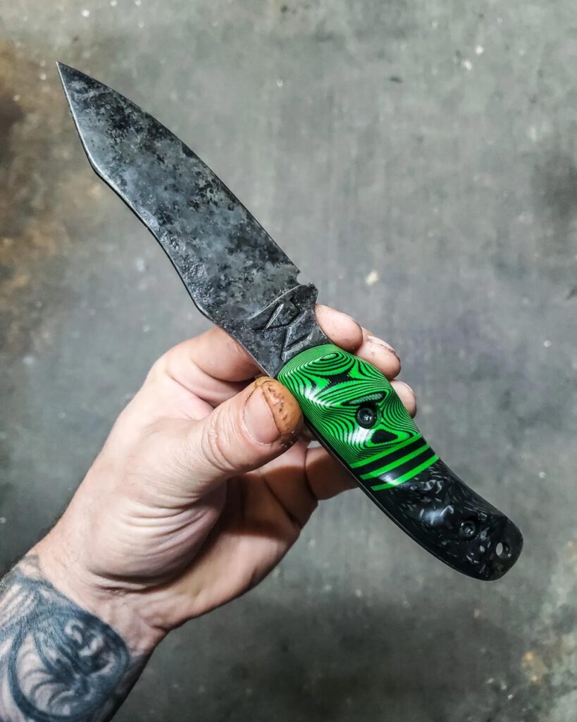 80crv2 with Granite finish handles carbon fiber and toxic green and black G10.