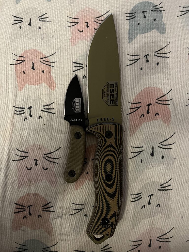 ESEE 5 next to the baby sized Candiru