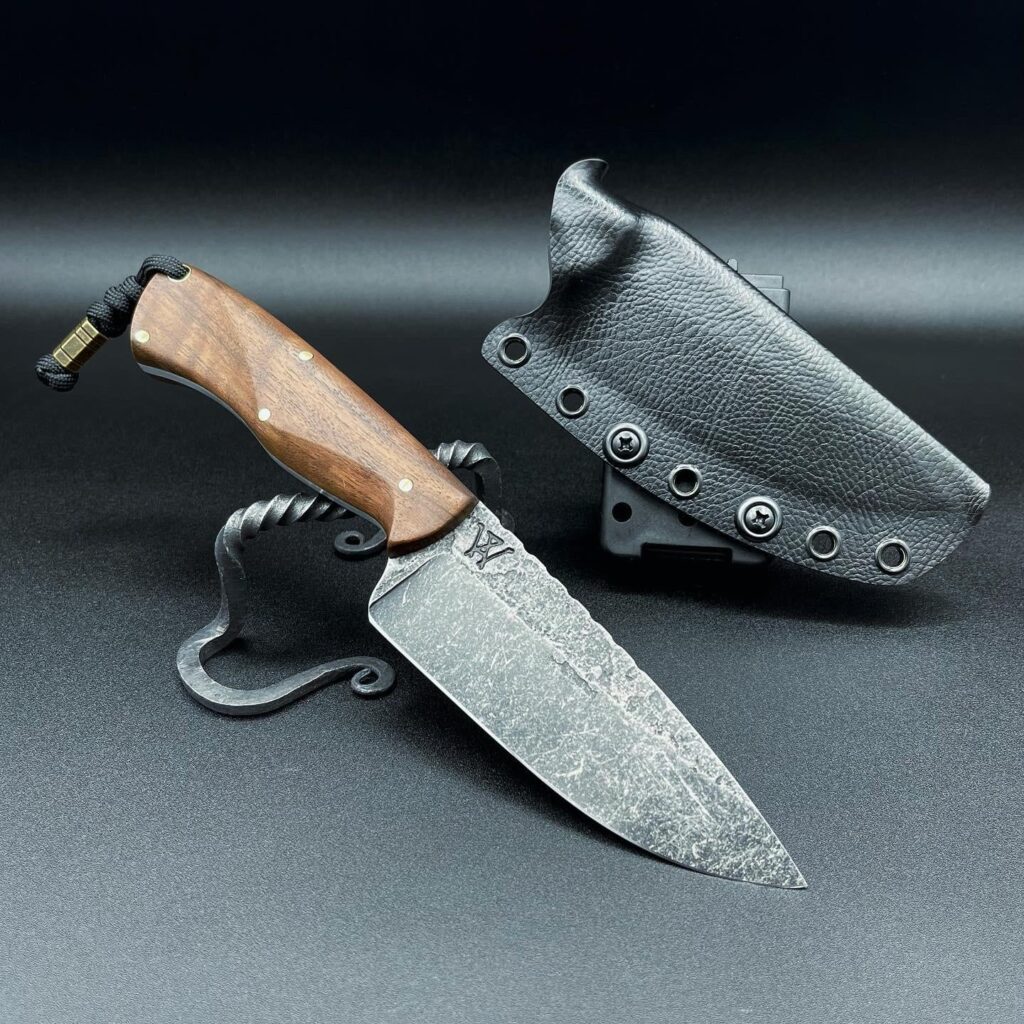 Forged Drop point handled with black walnut and brass