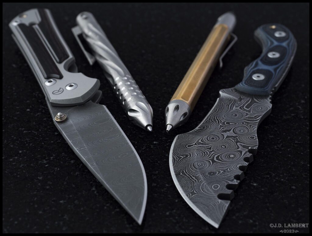 Some Damascus for hump day: Chris Reeve Sebenza & TOPS Tracker T4, Nottingham Tactical Pen & Pencil [OC]