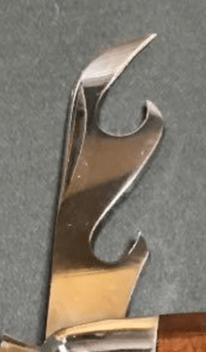 Does anyone know the purpose of this double can opener found on some knives? Is it just a bottle opener combo?