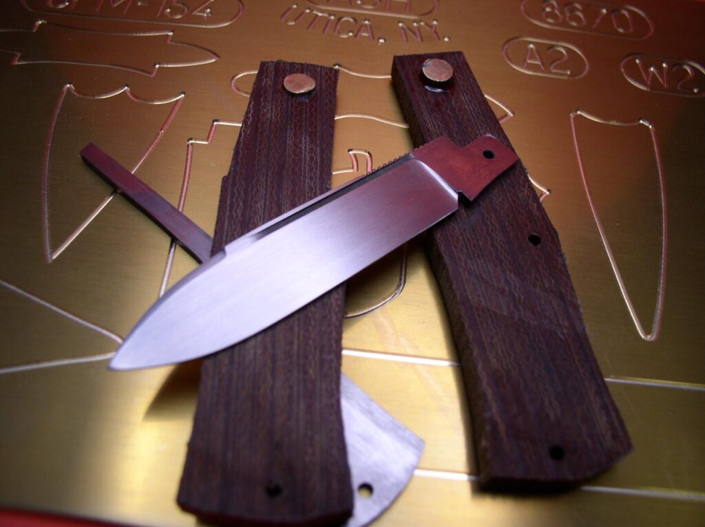 WIP gunstock cpm 154, shadow pattern with vintage micarta: instagram ash.handmade.knives
