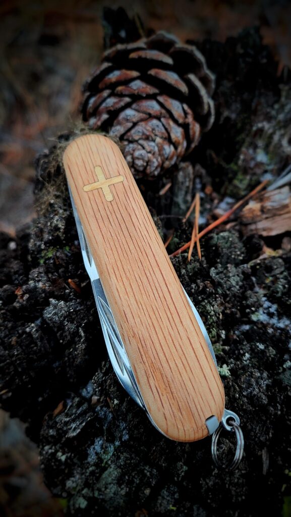 Custom crafted red oak on the Victorinox Spartan.