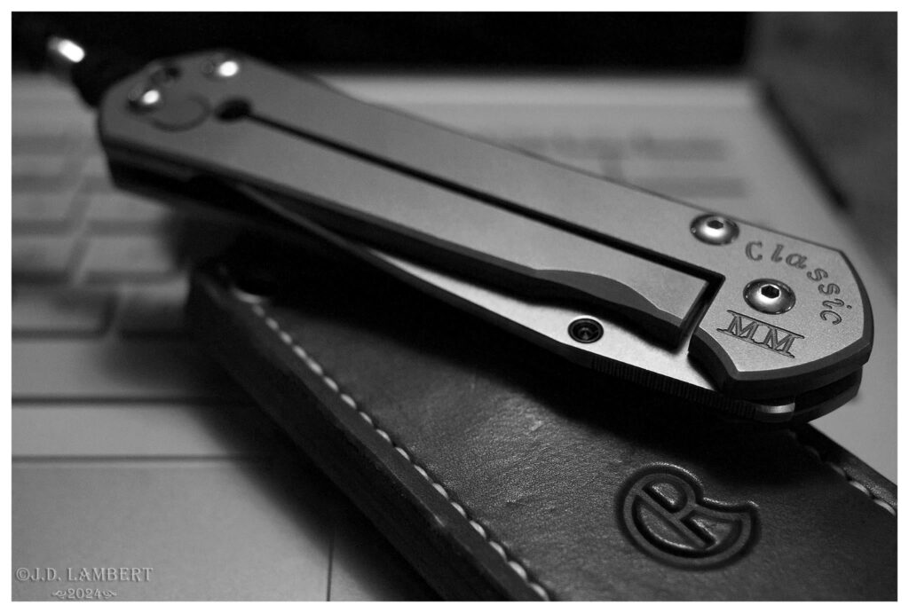 Chris Reeve Sebenza. Just messing around with some older camera gear (Panasonic GF1 & 20mm f/1.7). [OC]