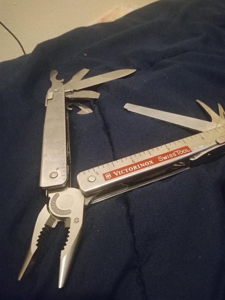 Can anyone identify this Swiss tool? I found 2 Gerber and this one Swiss tool in a drawer of an apartment we were clearing out. I don't use stuff like this so not familiar at all