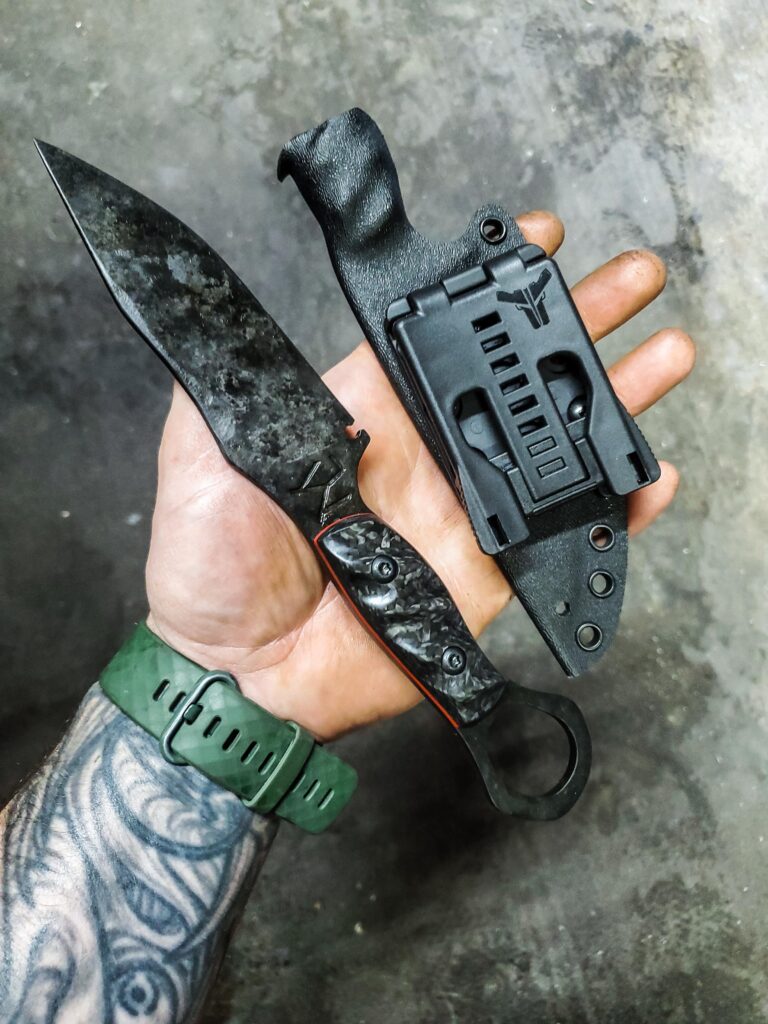80crv2 Granite finish with Carbon fiber handle/ Ruby Red G10 liners.