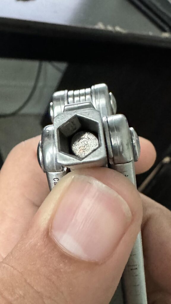 Super-glued the 2.5mm bit to the magnet, and pulled it out