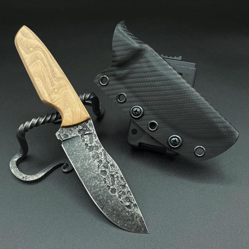 Pebble textured Drop point with hard maple and copper 👌 sheathed in carbon fiber Kydex