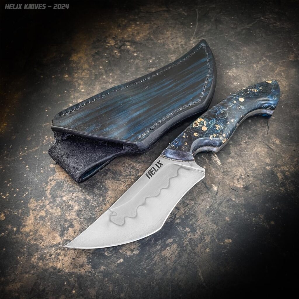 Just finished this one. 26C3 with a hamon and a stabilized maple burl handle.