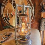 Cleaned up this "flashlight" the other day. 1890s C.T. Ham Side Spring Safety lantern with a bullseye globe. Beamshot in last photo.