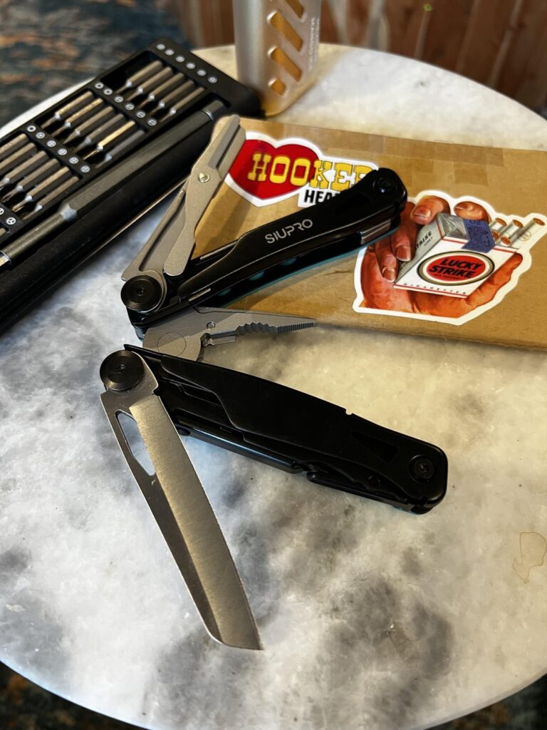 Siupro multi from Amazon. ~25 bucks. Actually pretty solid. With the exception of the clip jangling all the hell around.