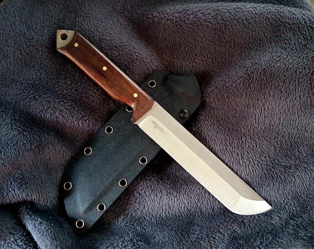 Compound grind tanto with classic micarta scales. What do you say?