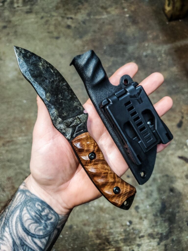 80crv2, Granite finish with Old growth Curly Redwood and black G10 liners.