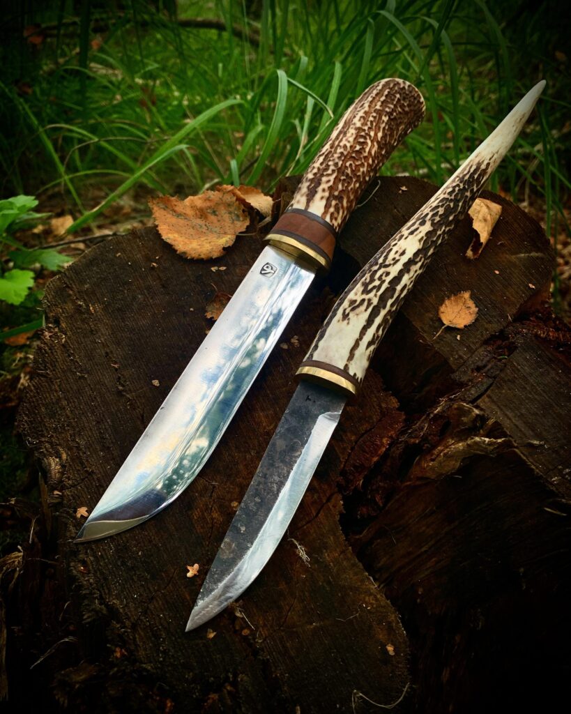 Two homemade knives, blades made by Antti Mäkinen and Tilo Knuth