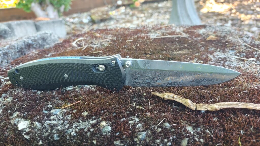 581 custom shop Barrage in carbon fiber, blue spacer & hand polished/re-etched Damasteel