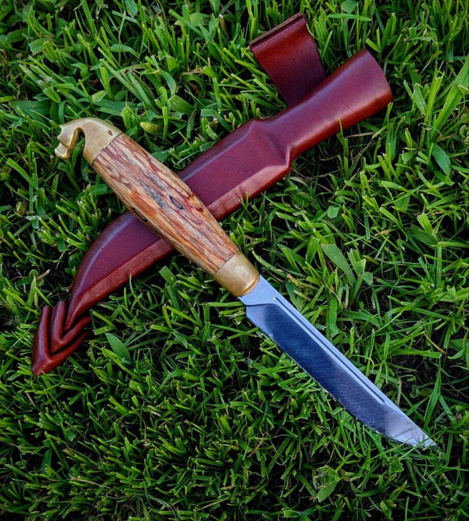 I have a mixed mind about this craft of mine. Made it to be like puukko, but somehow its style is falling off in my head. What do you think of it and how much would you price knife like that? I think 90 usd would be fair.