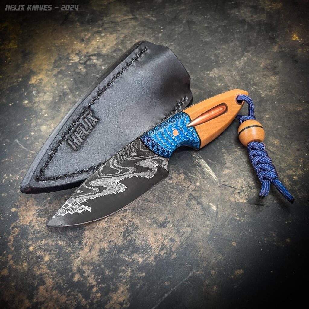 My latest. Chevron GoMai pocket knife, carbon fiber and canvas micarta handle with a 6.5mm projectile insert.